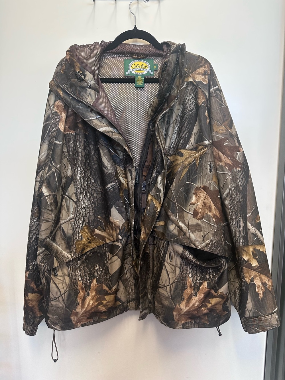 Cabela's Green and Yellow Outdoor Gear Jacket Label Detail